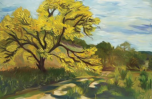 Late Summer Elm by Nancy Gray, oil on canvas painting of a sunlit elm tree with glowing yellow-green leaves beside a winding path in the Texas Hill Country 