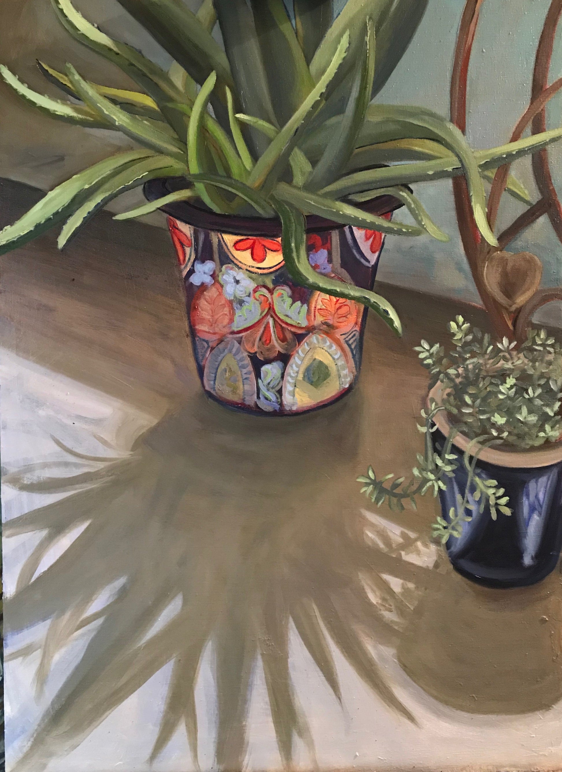 Aloe vera in a colorful Mexican pot with sunlight and shadows — oil on canvas by Nancy Gray.